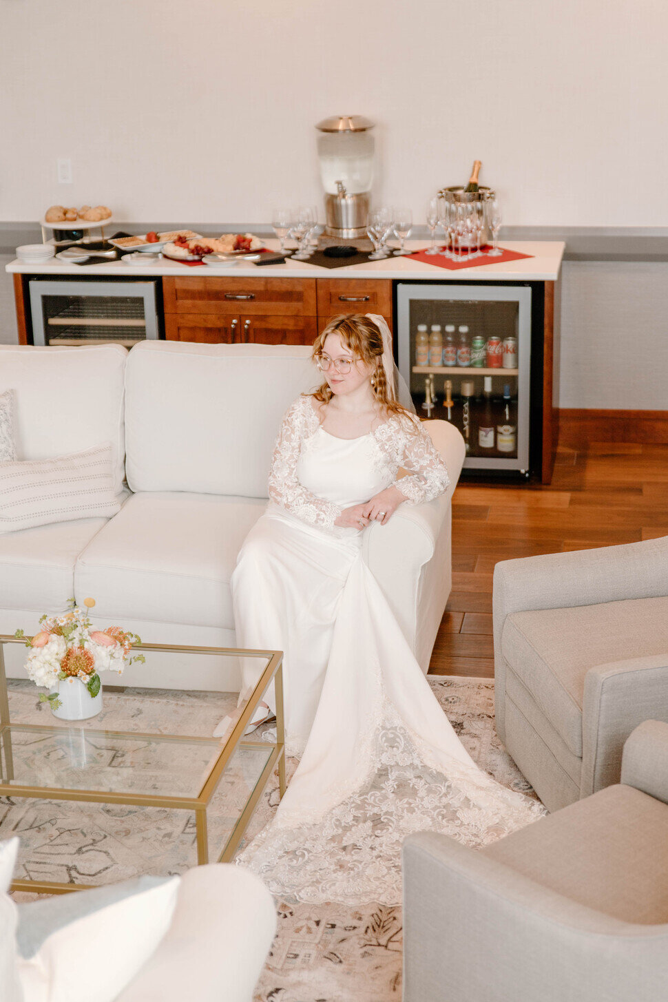 Bride sitting in the bridal suite at our Muscatine Hotel
