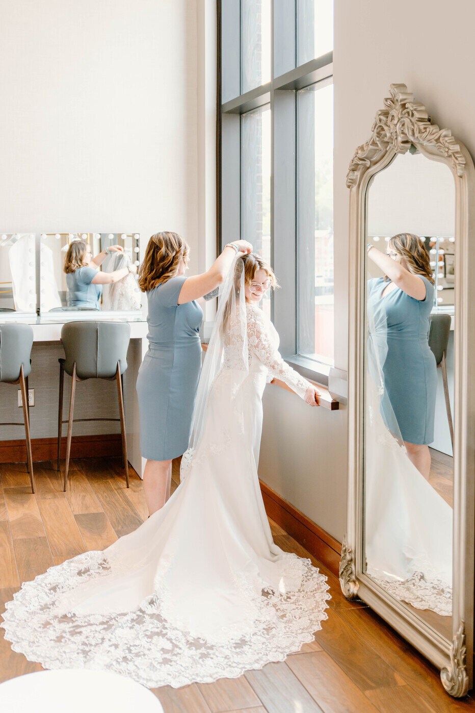 Bride getting ready in the bridal suite at our Muscatine Hotel